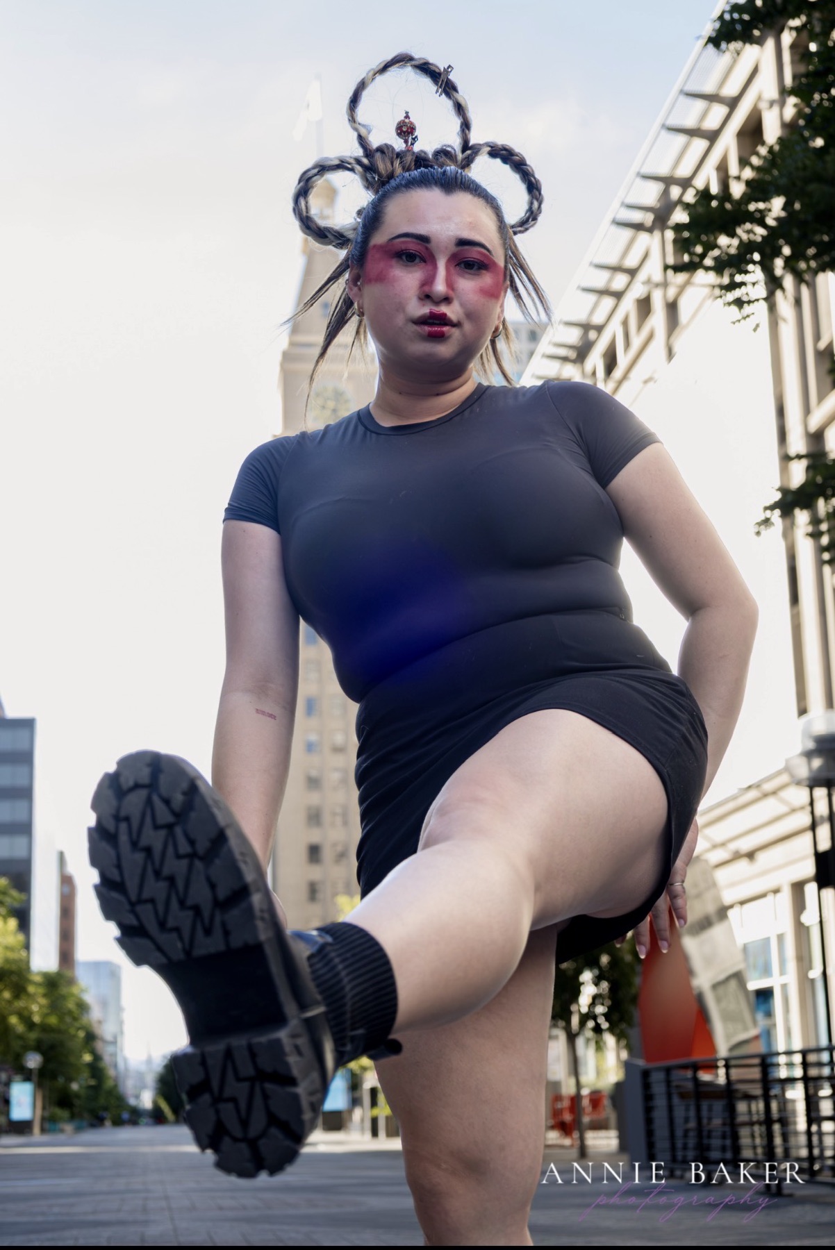 Editorial street shot with a sculptural braided crown